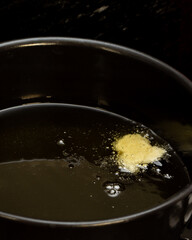 frying dough in cold oil, testing oil temperature