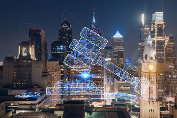Aerial panoramic cityscape of Philadelphia financial downtown at night time, Pennsylvania, USA. Glowing hologram of legal icons. The concept of law, order, regulations and digital justice.