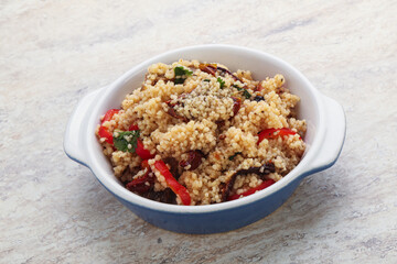 Arabic cous cous with meat and tomato