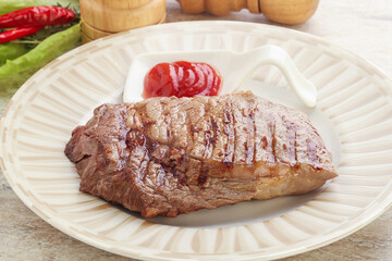 Grilled rib-eye steak beef meat