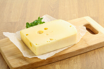 Maasdam cheese over the board
