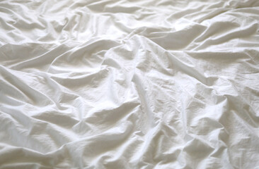 Fototapeta na wymiar Closeup white bedding background.