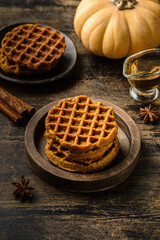 pumpkin waffles on a dark wooden background