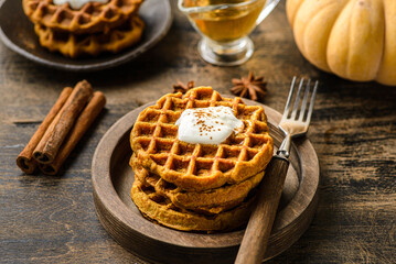 pumpkin waffles on a dark wooden background