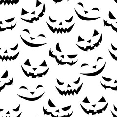 Seamless pattern of smiling faces ghosts in flat style. Vector Halloween's texture or background for party, poster, invitation, any design. Danger animal. Black and white, isolated
