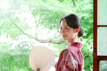 Beautiful Japanese woman smiling in yukata