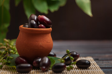 Close-Up of collection of Indian Ayurvedic medicinal fresh organic fruit jamun (Syzygium Cumini) 