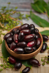 Close-Up of collection of Indian Ayurvedic medicinal fresh organic fruit jamun (Syzygium Cumini)