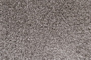 A beige carpet texture close-up,Close up of fluffy carpet.