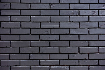 Mur de briques peint en noir