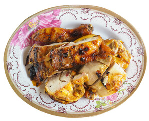 roast chicken in dish dicut on white background