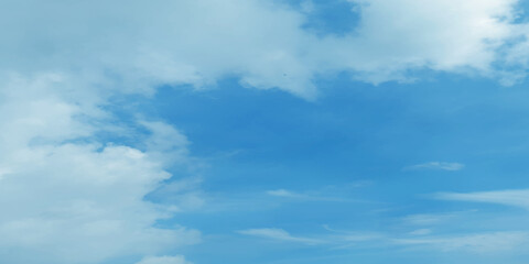 Obraz premium Heavy clouds covered the view of natural cloudy blue morning sky, Bright and shinny natural and cloudy sky background for wallpaper, cover, card, decoration and design.