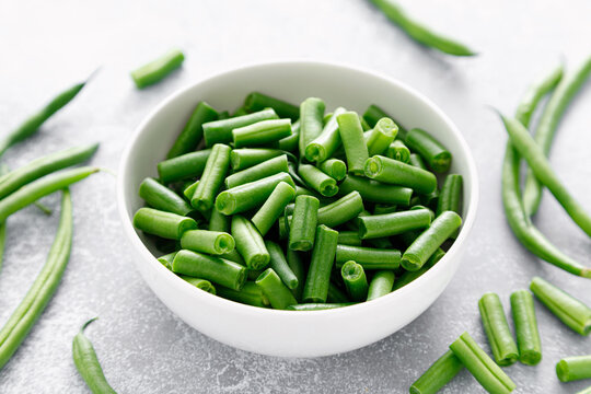 Fresh raw green beans cut in a bowl. French green beans