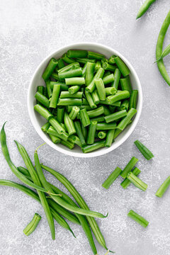 Fresh raw green beans cut in a bowl. French green beans