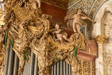 Fototapeta na wymiar The organ, a gift of King John V inside Saint Michael Chapel in the University of Coimbra, Portugal