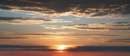 Fototapeta premium Beautiful sunset sky with some clouds