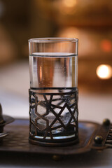 Water in a glass in Turkish style.