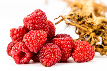 Fresh Raspberries isolated in white background, detailed texture, studio lighting, negative space