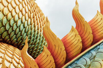 Closeup serpent fin statue in Thailand