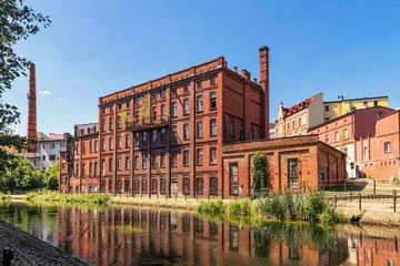 Gordijnen Old abandoned factory on the outskirts of London  © konoplizkaya