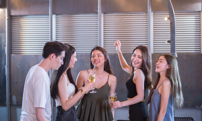 Group of teenagers celebrating party.