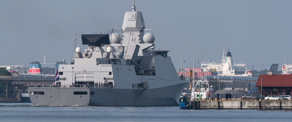 WARSHIP - A modern frigate is going to the port