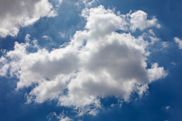 Random shape of cloud on clear blue sky