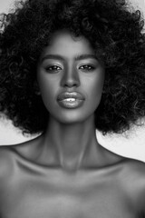 Sensual African woman with curly afro hair