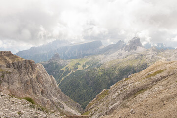 Mountain landscape in a cloudy day. The Cinque Torri seen from above of South side, Dolomites.