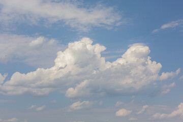 Fototapeta na wymiar Cumulus clouds in sunny day. Atmosphere background or wallpaper
