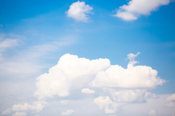 Naklejka na ściany i meble Beautiful clouds against the blue sky. Fluffy clouds, cloudy weather.