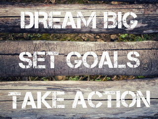 Aspiration Concept - dream big set goals take action text background. Stock photo.