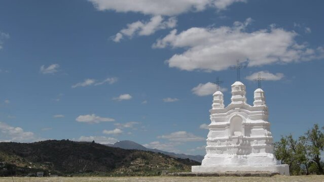 Vicar altar, religious monument, a sunny day with clouds, Monda, Malaga, Spain
