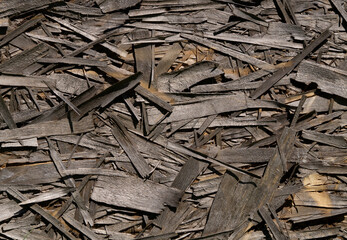 The background is made of old wood chips.Selective focus.Plywood darkened by time.