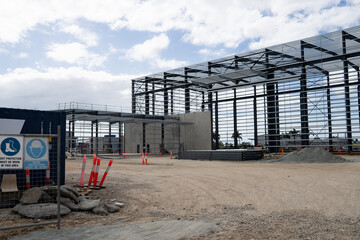 Large steel framed warehouse being erected in Paget, Mackay, Queensland Australia with copy space.