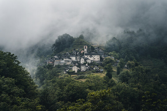 Ancient village of Corippo situated near Lavertezzo on a hill surrounded by forest and mountains in Canton Ticino, Switzerland.