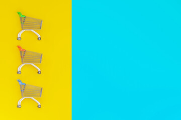 top view of empty shopping cart on color background 3d illustration


