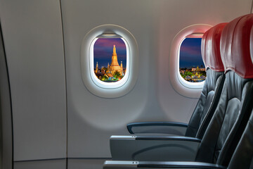 Wat Arun in Bangkok from airplane window. Holiday and Travel concept.