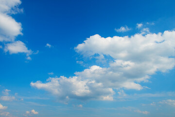 Naklejka na ściany i meble Blue Sky With Scattered Clouds With A Sun 