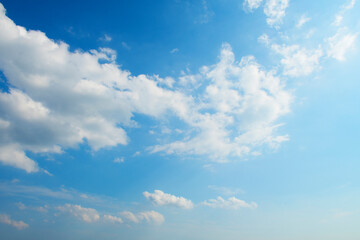 Naklejka na ściany i meble Blue Sky With Scattered Clouds With A Sun 