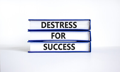 Destress for success symbol. Concept words Destress for success on books. Beautiful white table white background. Psychological business and destress for success concept. Copy space.