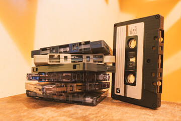 A pile of old fashioned cassette tapes