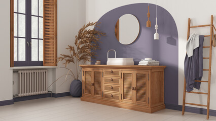 Classic bathroom in vintage white and purple tones, rattan wooden washbasin, chest of drawers, mirror, towel rack and decor. Parquet and window with shutters. Modern interior design