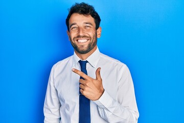 Handsome man with beard wearing business shirt and tie smiling cheerful pointing with hand and finger up to the side