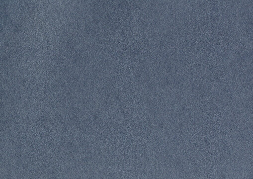 High quality, highly detailed large image of black, dark gray uncoated paper texture background with fine rough fiber and distinguished grain with copy space for text for material mockup or wallpaper