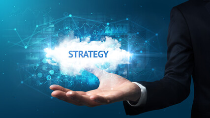 Hand of Businessman holding motivational message