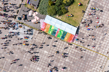 Equality parade, pride march in Warsaw, Poland, June 25 2022. Celebration of LGBT people and protests against homophobia, aerial view.