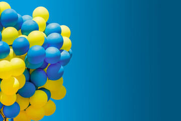 Yellow and blue balloons. Big bunch of balls. helium balloon background with place for text. Copy space.