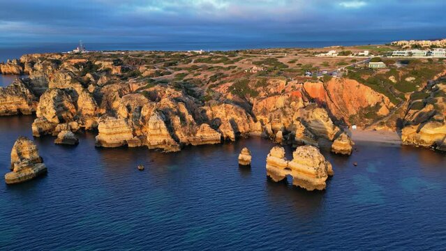 Flying Over the Ocean, Panoramic Coast at Sunrise, View of the Cliffs, The Praia do Camila and Farol da Ponta da Piedade Lagos, Algarve, Portugal