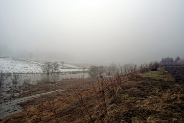 high river bank in early spring